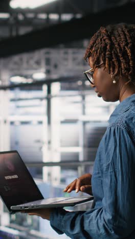 vertical video worried workers trying to fix hacked infrastructure systems