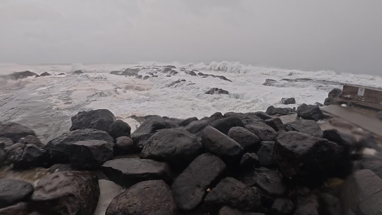 Cyclone Alfred - Destructive And Huge Waves Hitting The Rocky Coastline Of Gold Coast, QLD, Australia. - pan shot