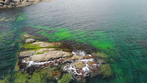 Fast-aerial-shot---drone-fly-around-seashore-rocky-coast