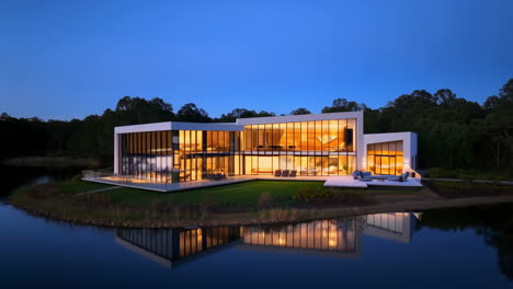 modern waterfront luxury home at dusk