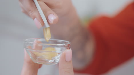 woman applying skincare product