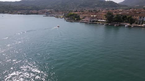 Aerial-view-of-Garda-lake-and-Salo-city,-Italy