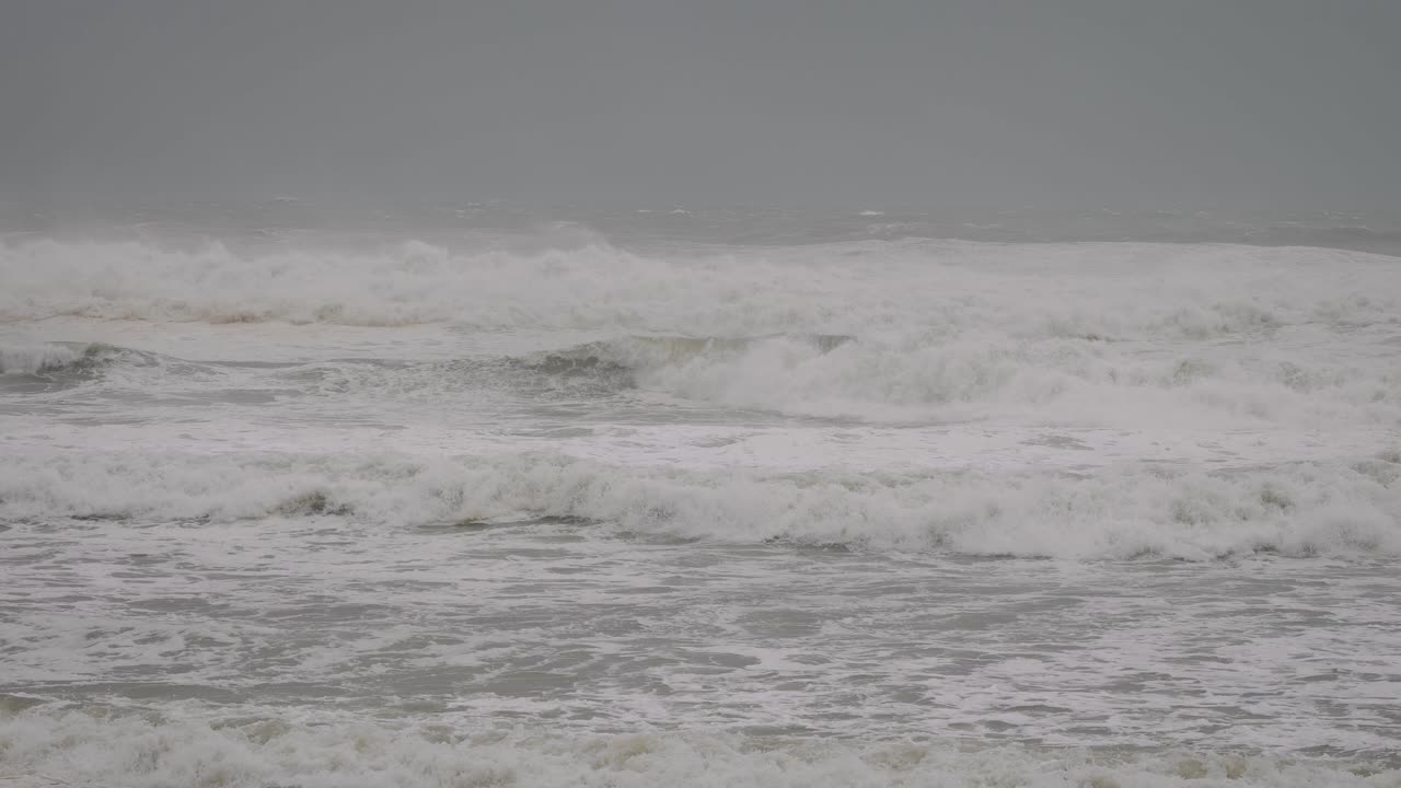 View from Burleigh Heads as rain, clouds and massive waves hit the coast due to Cyclone Alfred.