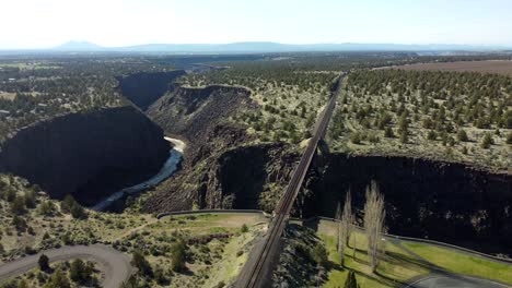 us, oregon, redmond, crooked river high bridge, 2025-04-12 - drone view of the railroad bridge over the crooked river at highway 26 in spring in central oregon