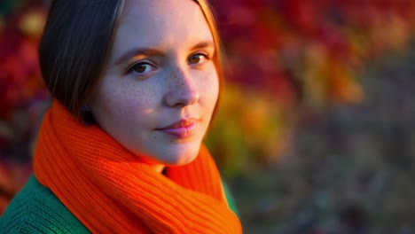 teenage girl in autumn leaves