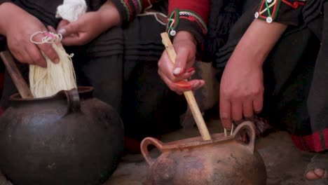 peruvian women dyeing alpaca yarn .mp4