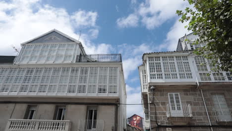 galician architecture: charming white building with many windows