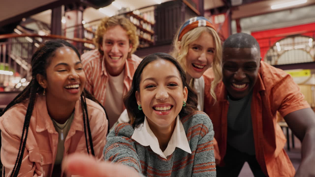 Group of friends smiling in library