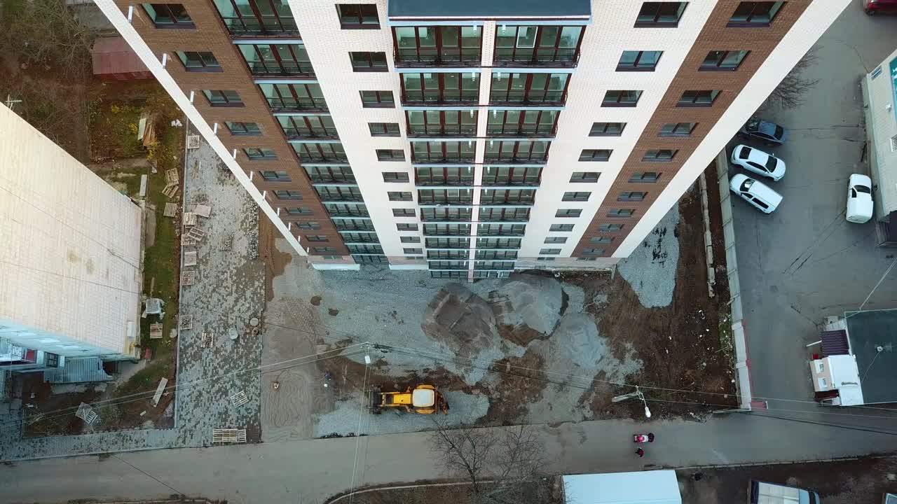Construction of modern building. Aerial view of high construction building