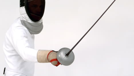 sportsman playing fencing