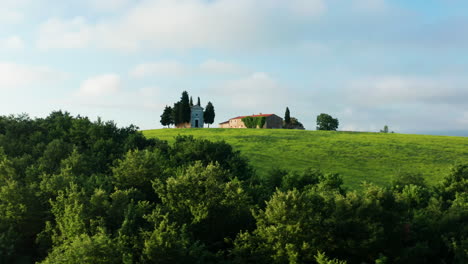 the chapel of the madonna di vitaleta, aerial pan establishing shot