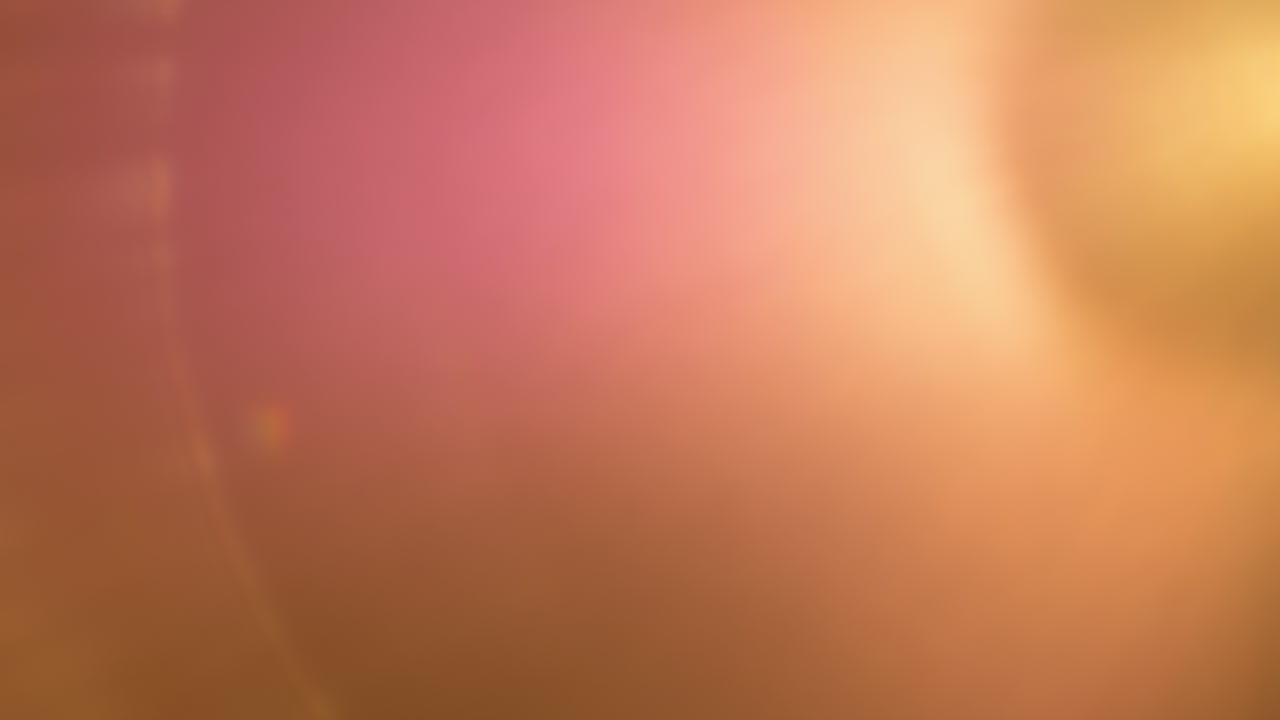 Slow transition of abstract yellow lens flare