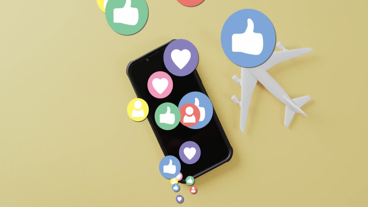 Animation af medieikoner over fly og smartphone