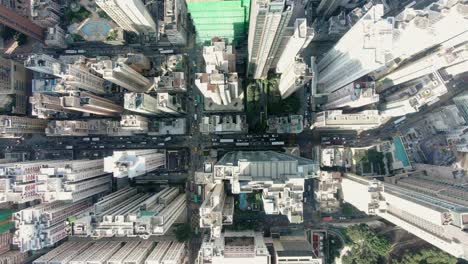 Downtown-Hong-Kong-city-skyscrapers-and-urban-traffic,-Aerial-view