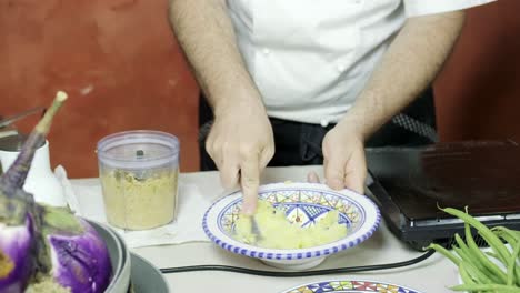 chef-smash-potato-cocked-preparing-in-organic-natural-ingredient-kitchen-italian-cousin