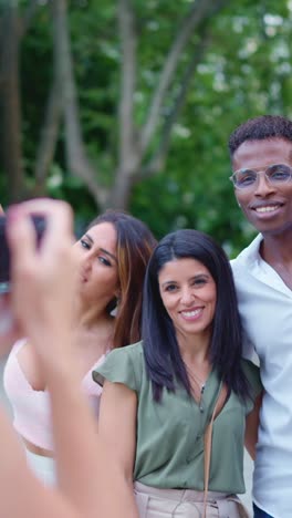 group of friends taking fun photos together