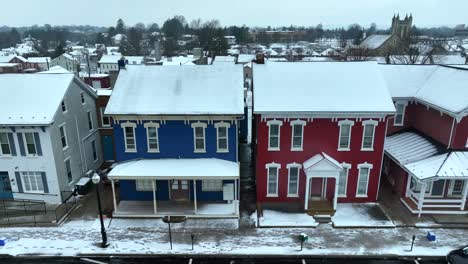 blue and red houses in small town america