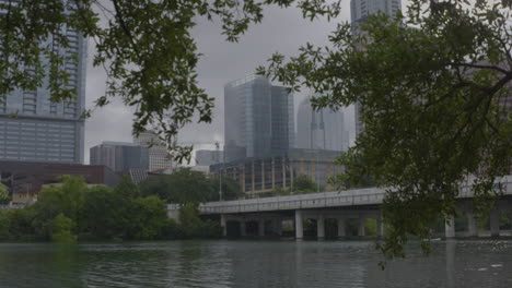 austin, texas skyline pan down to colorado river