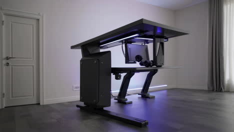 modern black adjustable standing desk with integrated led lighting