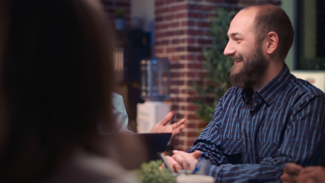 Coworkers business meeting, african american employee speaking close up
