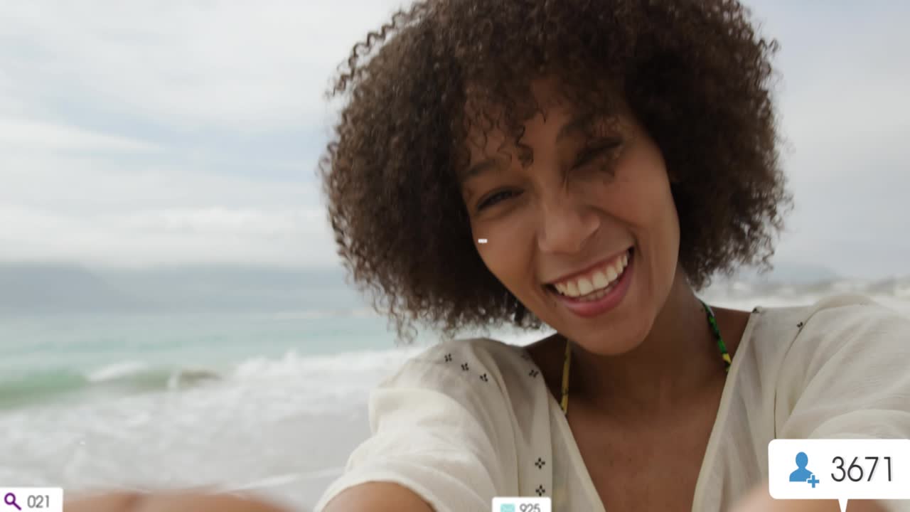 Creator raising smartphone on beach summoning social media metrics demonstrating engagement growth