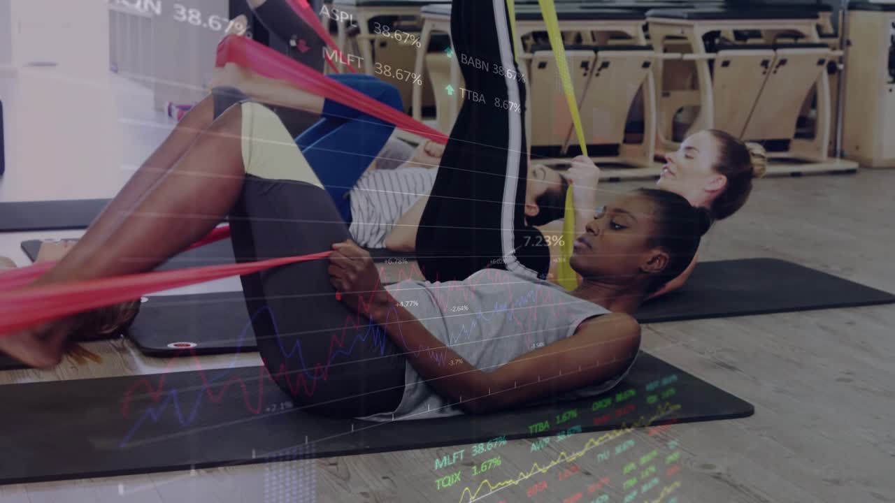 Pilates crew looping bands around feet and performing leg raises together with metrics overlay