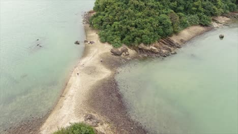 Hong-Kong-bay,-with-a-strip-of-sand-connecting-small-natural-islands,-Aerial-view