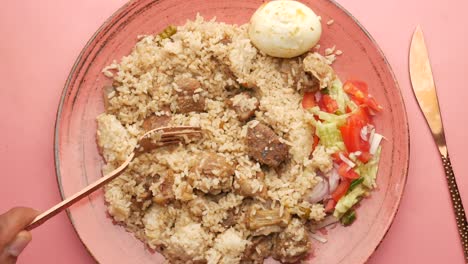 biryani with lamb and salad