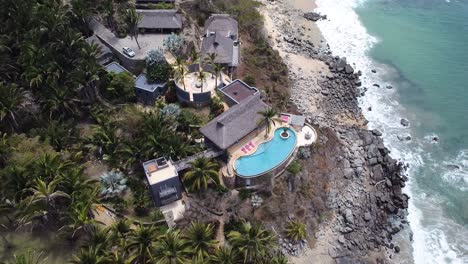 aerial drone of a fancy villa in carricitos beach in sayulita, nayarit, mexico