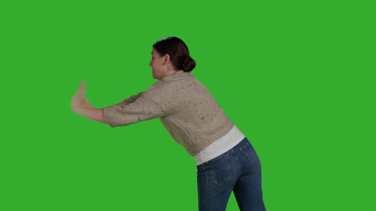 Woman standing on green screen
