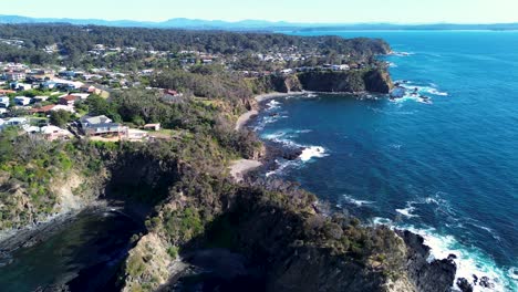 Drone-aerial-scenic-housing-rocky-landscape-coastline-headland-view-housing-Malua-Bay-Batemans-Bay-NSW-South-Coast-travel-tourism-Australia-4K