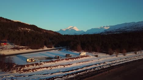 Drone-footage-with-intresting-move-over-beach-to-mountains-silhouette