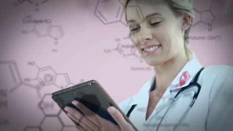 mujer médico que usa una tableta