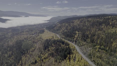 Highway-to-the-Clouds:-Aerial-Footage-of-Elevated-Route-24-Amidst-Fall-Glor