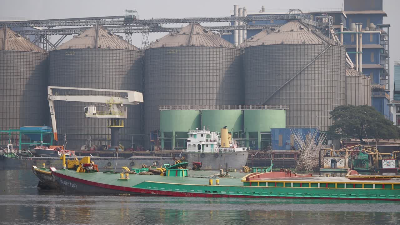Industrial Port with Grain Silos and Barges