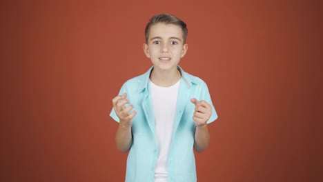 Boy-giving-motivational-speech-to-camera.