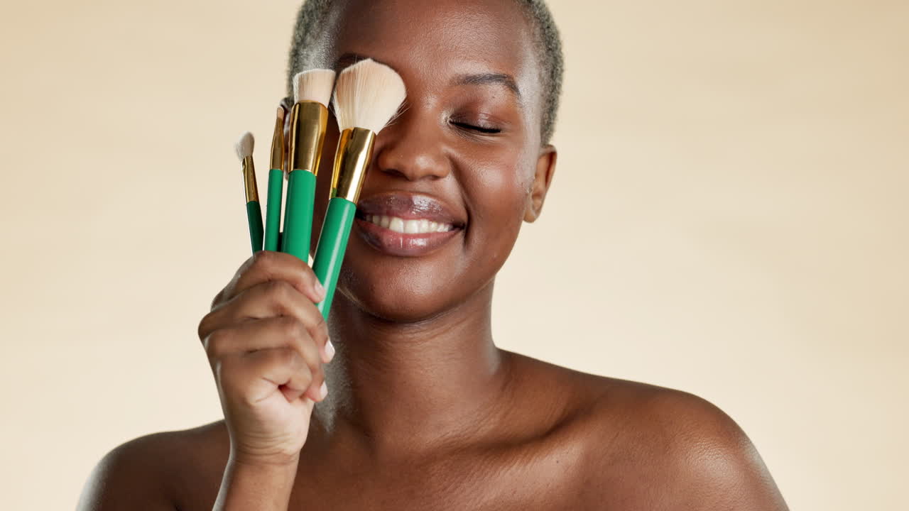 Beauty, makeup and brush with black woman