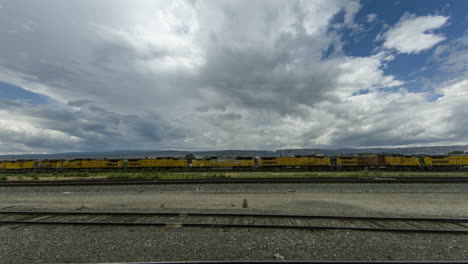 timelapse of a stormy sky in new mexico taken from a stopped train