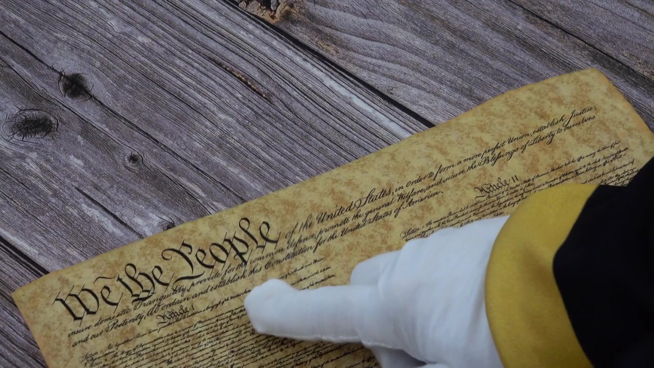 Reading the US Constitution honoring American freedom liberty democracy patriotism and the enduring spirit of the founding fathers and the United States Republic