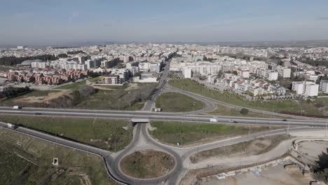 altamura, italy skyline with highway and traffic with drone video pulling out