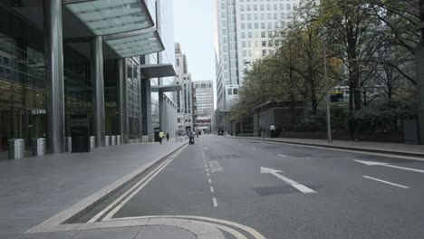 quiet empty road in canary wharf london lockdown restrictions covid 19