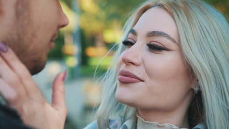 Portrait-Of-Pretty-Young-Blonde-Woman-In-Makeup-With-Lipstick-Looking-At-Boyfriend