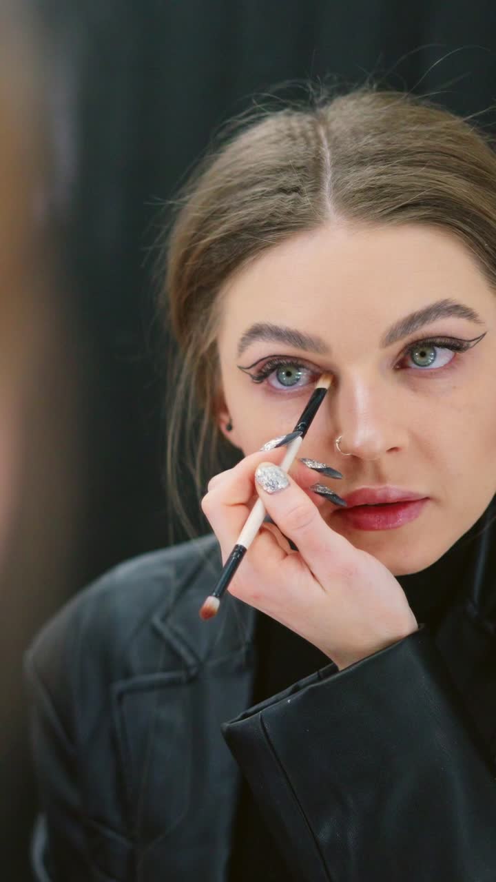 Woman Applying Eye Makeup