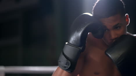 young boxer training in the ring