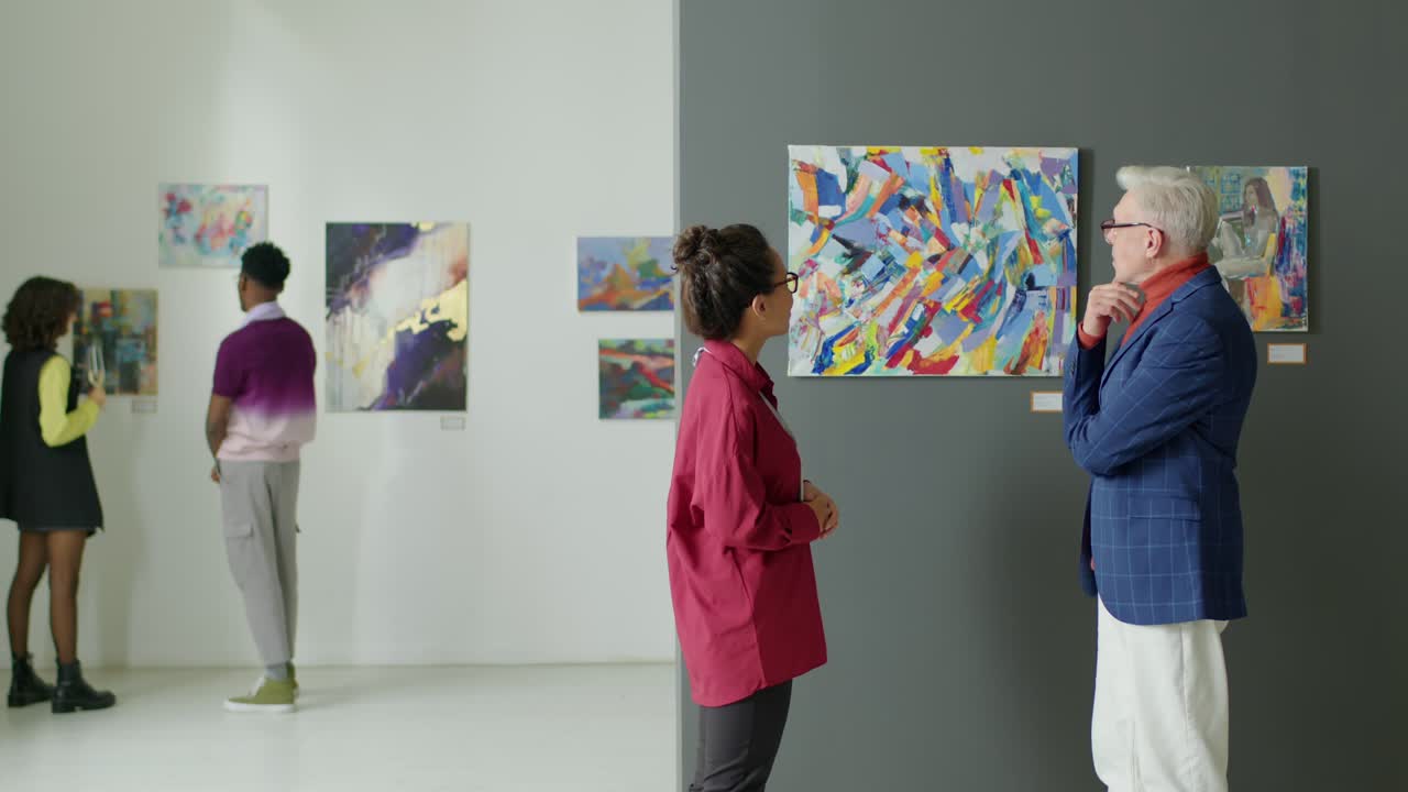 Gallery Visitors Discussing Painting