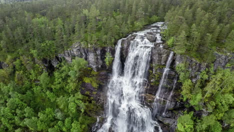 aerial footage from tvindefossen waterfall, norway