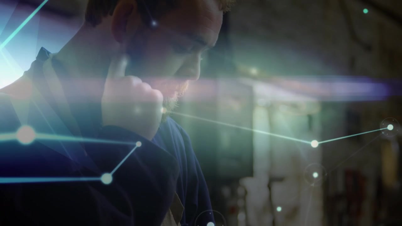 Animation of network of connections over caucasian man using tablet