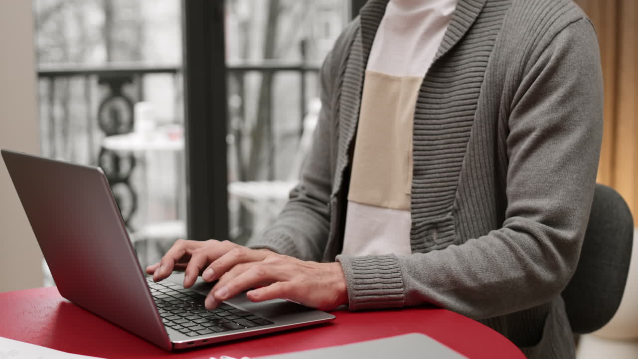 Person Typing on Laptop Computer