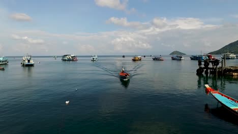 longtail boat arrive without costumer camera follow while fly backward