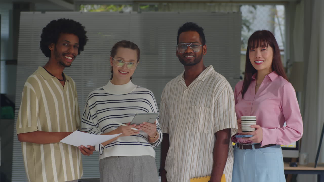 Portrait of Four Multiethnic Specialists at Office
